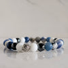 Glacier Bay Bracelet in blue, white, silver, and charcoal tones inspired by Glacier Bay Alaska